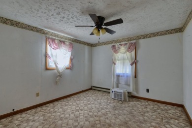 Charming 3 bedroom, one level home on over 5 ACRES WITH CREEK &