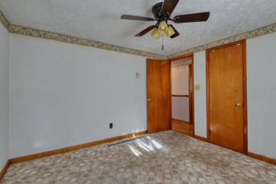 Charming 3 bedroom, one level home on over 5 ACRES WITH CREEK &