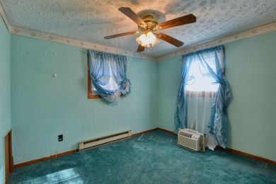 Charming 3 bedroom, one level home on over 5 ACRES WITH CREEK &