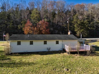 Charming 3 bedroom, one level home on over 5 ACRES WITH CREEK &