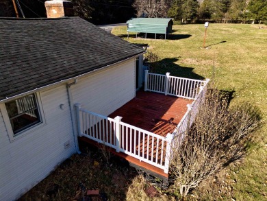 Charming 3 bedroom, one level home on over 5 ACRES WITH CREEK &