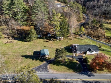 Charming 3 bedroom, one level home on over 5 ACRES WITH CREEK &