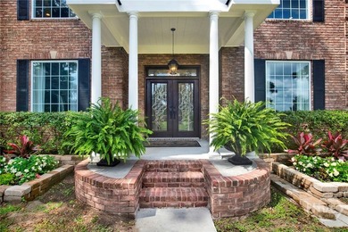 Nestled beneath majestic live oaks on a picturesque 1.9-acre - photo 7