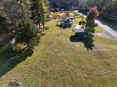 Charming 3 bedroom, one level home on over 5 ACRES WITH CREEK &
