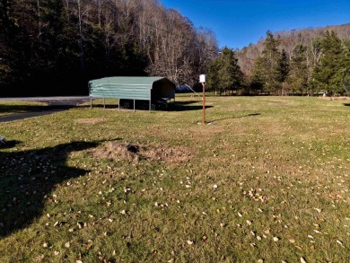Charming 3 bedroom, one level home on over 5 ACRES WITH CREEK &