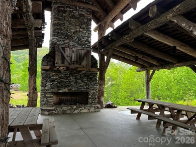 Discover the perfect mountain escape with this level, one-acre - photo 9
