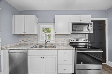 Welcome to 171 Oakland Street! This 4-bedroom, 2-bath home - photo 18