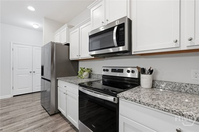 Yes, please! This 4-bedroom, 2.5-bath townhome in the heart of - photo 8