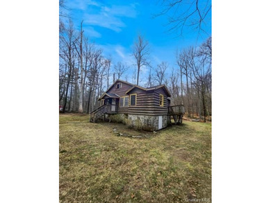 Located in the serene lakeside community of Smallwood, this - photo 11