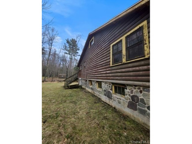 Located in the serene lakeside community of Smallwood, this - photo 12