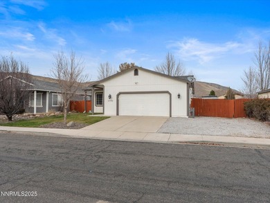 This beautifully updated Nevada-lifestyle home offers a rare