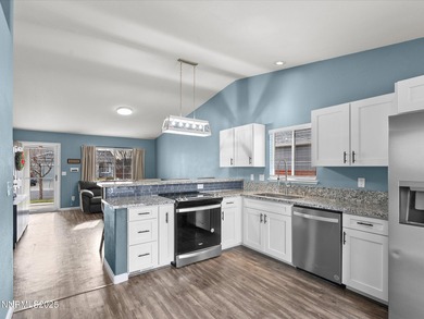 This beautifully updated Nevada-lifestyle home offers a rare