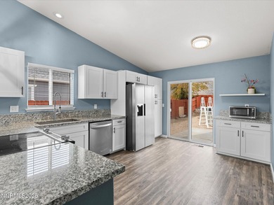 This beautifully updated Nevada-lifestyle home offers a rare