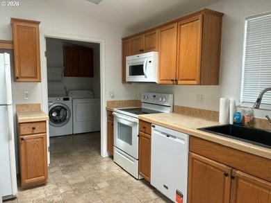 Step into comfortable, low-maintenance living in this - photo 9