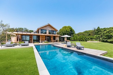 Redesigned and entirely rebuilt in 2021, this seamless residence - photo 3