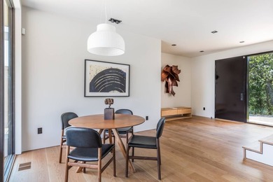 Redesigned and entirely rebuilt in 2021, this seamless residence - photo 10