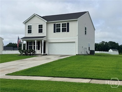 Positioned on a pond-view lot, this move-in ready 2023-built - photo 4