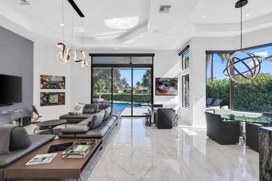Fully renovated Mizner Country Club estate with sweeping golf - photo 6