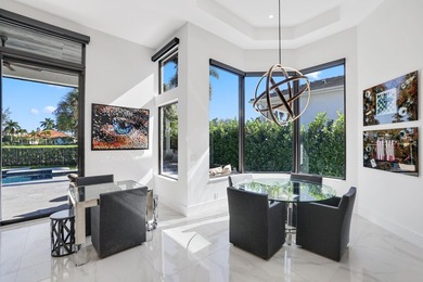 Fully renovated Mizner Country Club estate with sweeping golf - photo 10