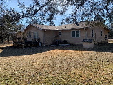 Charming 3-bedroom, 2-bath home situated on a full 1-acre fully - photo 11