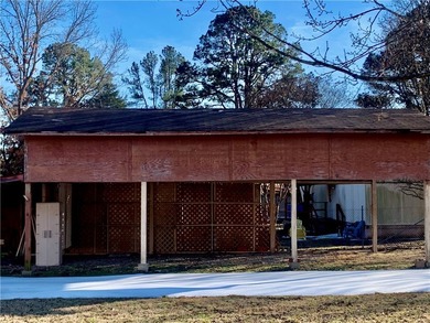 Charming 3-bedroom, 2-bath home situated on a full 1-acre fully - photo 15
