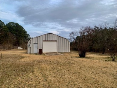 Charming 3-bedroom, 2-bath home situated on a full 1-acre fully - photo 17