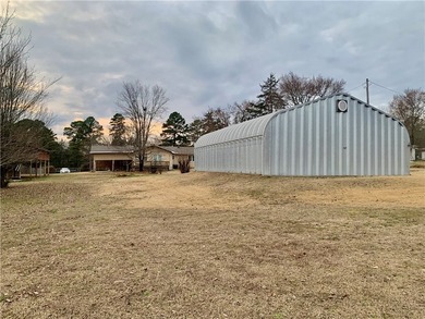Charming 3-bedroom, 2-bath home situated on a full 1-acre fully - photo 18