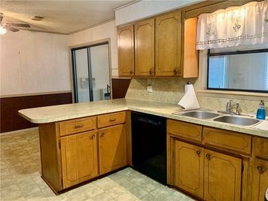 Charming 3-bedroom, 2-bath home situated on a full 1-acre fully - photo 28