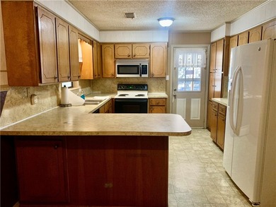 Charming 3-bedroom, 2-bath home situated on a full 1-acre fully - photo 29