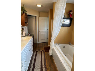 This 3132 sq ft 4 bedroom 3 bath Ranch style home with a walk - photo 34