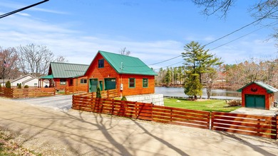 Experience the best of lakeside living with this beautifully - photo 2