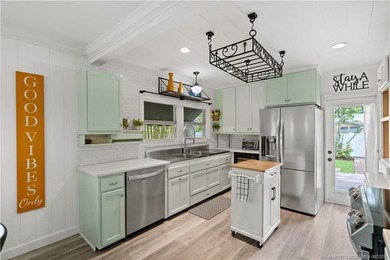 Live in one, rent the other, a rare income-producing gem in the - photo 11
