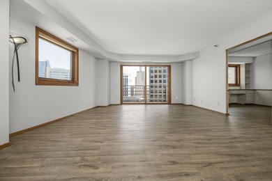 Soaring above the city on the 23rd floor, this refined 2-bedroom - photo 12