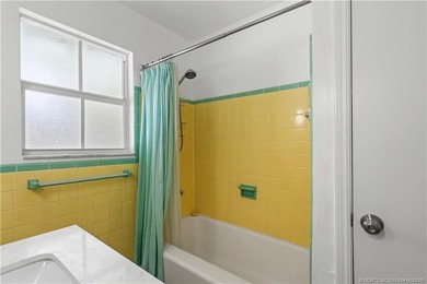 Live in one, rent the other, a rare income-producing gem in the - photo 18