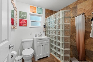 Live in one, rent the other, a rare income-producing gem in the - photo 33