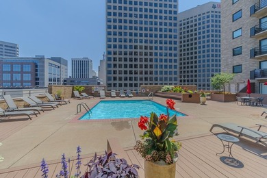 Soaring above the city on the 23rd floor, this refined 2-bedroom - photo 40