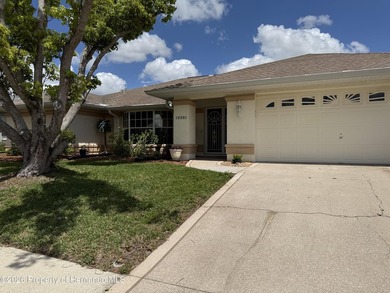 Welcome to 10381 Sandtrap Drive, a beautifully maintained - photo 2