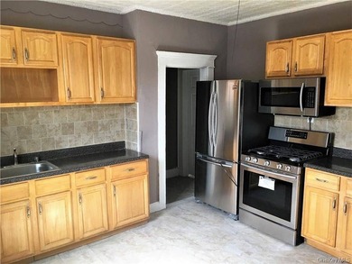 Large three family investment property. Two of the units are - photo 4