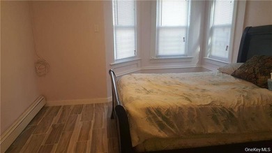 Large three family investment property. Two of the units are - photo 5
