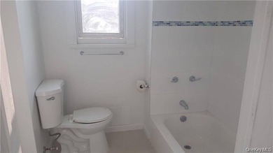 Large three family investment property. Two of the units are - photo 6