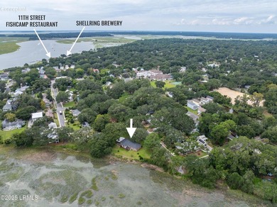 Tucked beneath a canopy of moss-draped live oaks, this home in - photo 23
