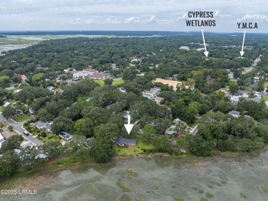 Tucked beneath a canopy of moss-draped live oaks, this home in - photo 24