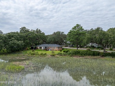 Tucked beneath a canopy of moss-draped live oaks, this home in - photo 37