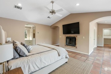 This stunning Neo-Spanish Revival home is nestled among majestic - photo 15