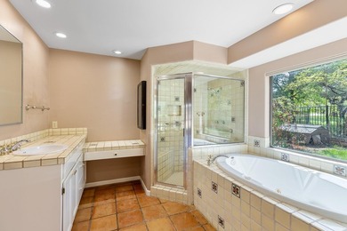 This stunning Neo-Spanish Revival home is nestled among majestic - photo 17