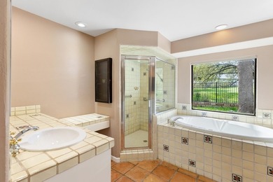 This stunning Neo-Spanish Revival home is nestled among majestic - photo 18