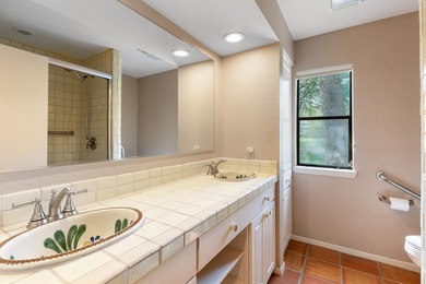 This stunning Neo-Spanish Revival home is nestled among majestic - photo 21
