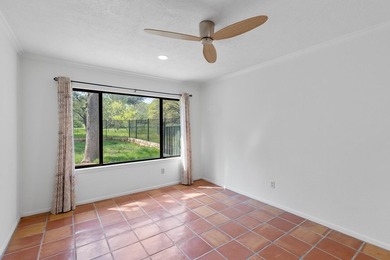 This stunning Neo-Spanish Revival home is nestled among majestic - photo 23