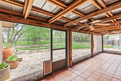 This stunning Neo-Spanish Revival home is nestled among majestic - photo 26