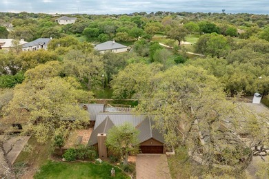 This stunning Neo-Spanish Revival home is nestled among majestic - photo 28